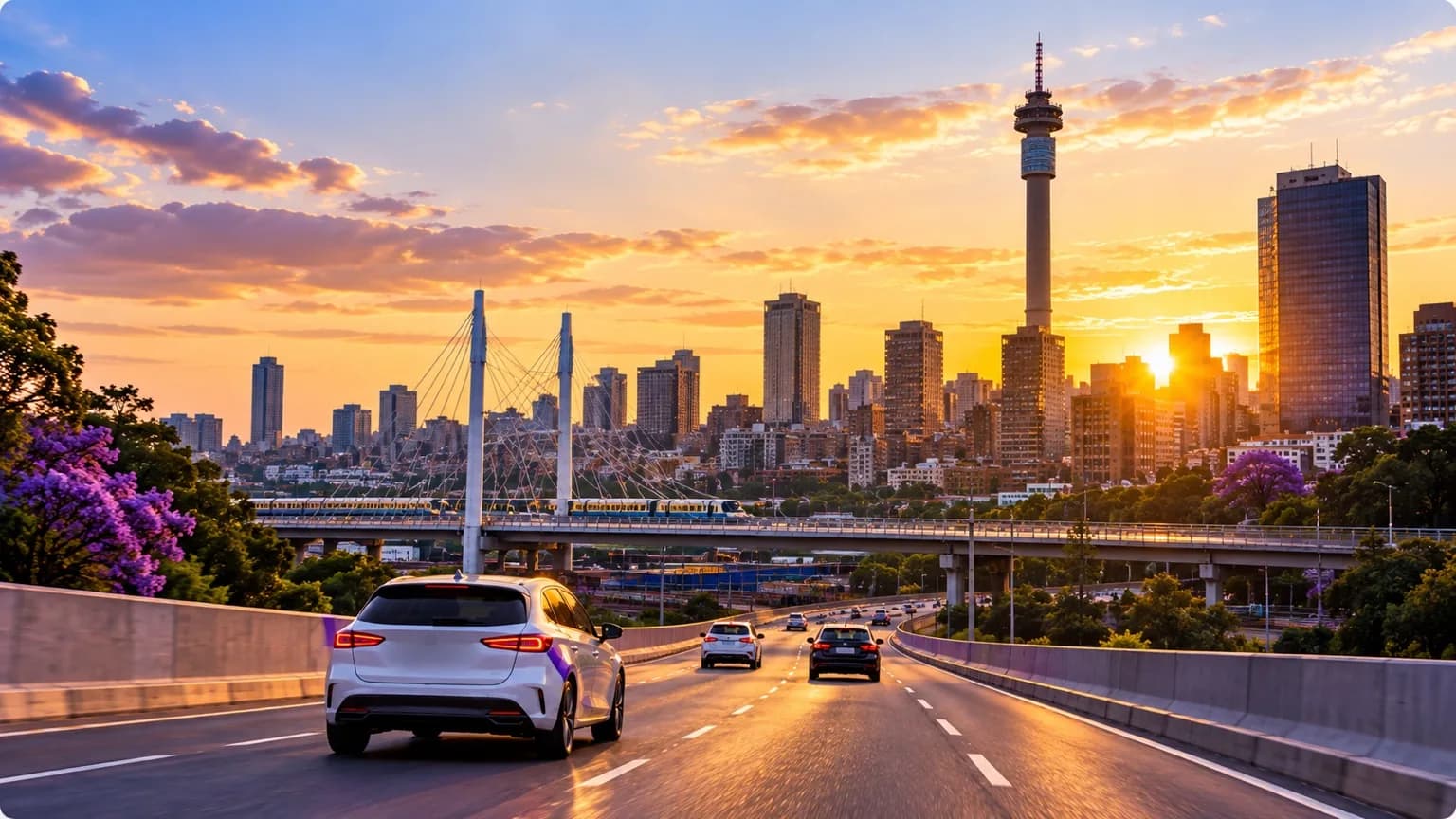 Johannesburg skyline at golden hour with traffic moving toward the city